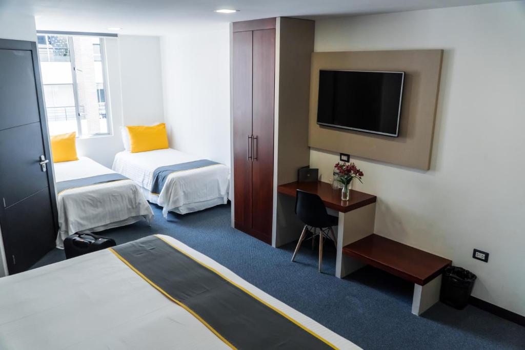 Postel nebo postele na pokoji v ubytování Hotel Finlandia