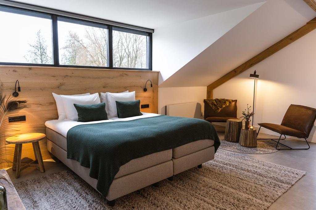Postel nebo postele na pokoji v ubytování Hoeve BuytenHout