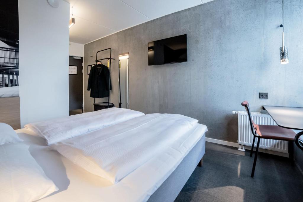 Postel nebo postele na pokoji v ubytování Four Points Flex by Sheraton Aarhus Skejby