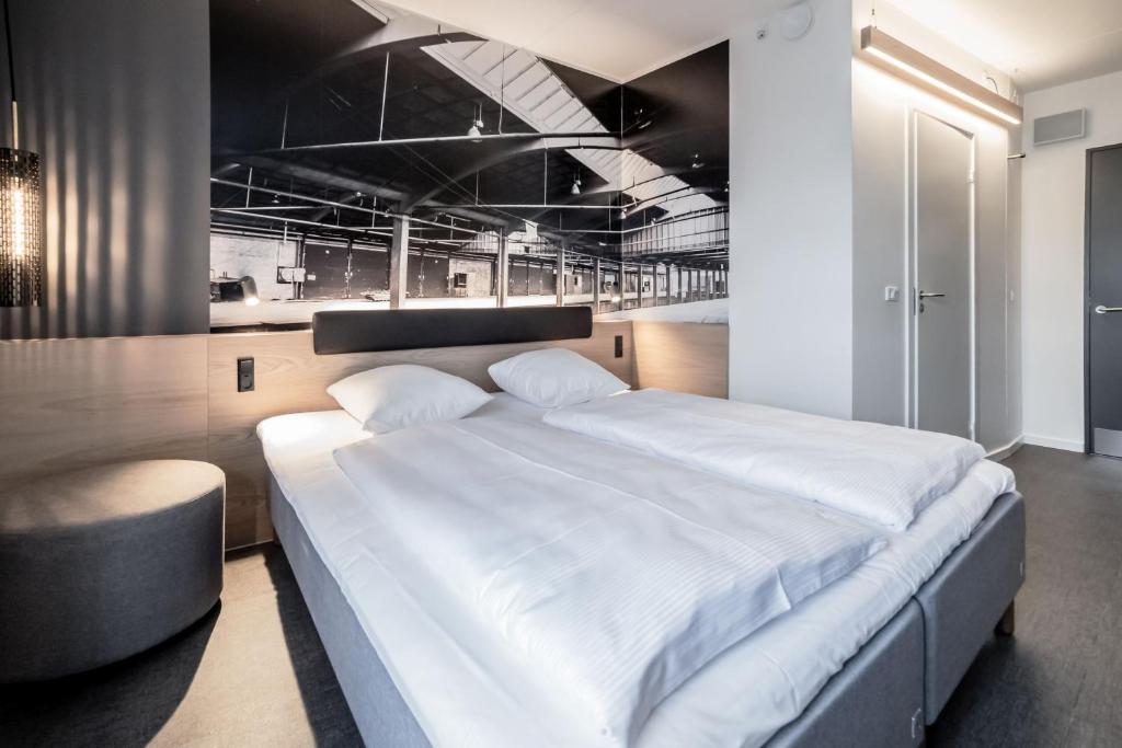 Postel nebo postele na pokoji v ubytování Four Points Flex by Sheraton Aarhus Skejby