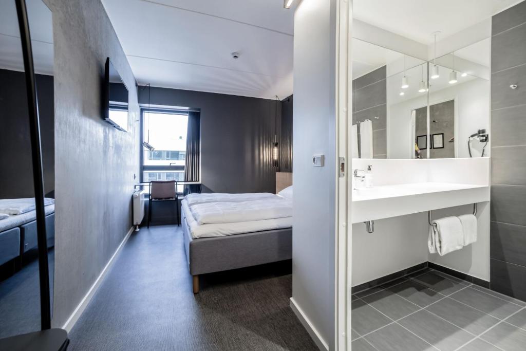 Postel nebo postele na pokoji v ubytování Four Points Flex by Sheraton Aarhus Skejby