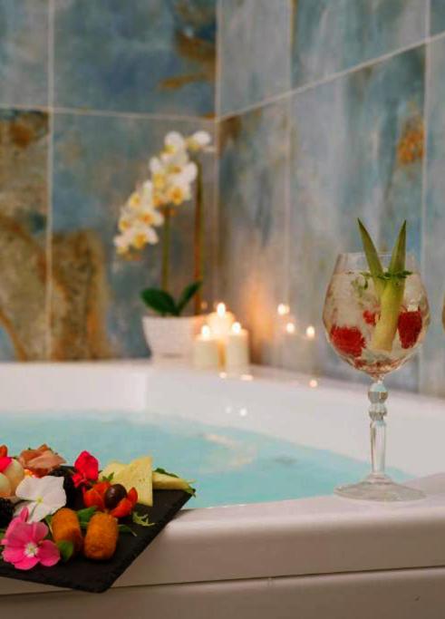 PLAZA Boutique Hotel - Tropea italokat is kínál