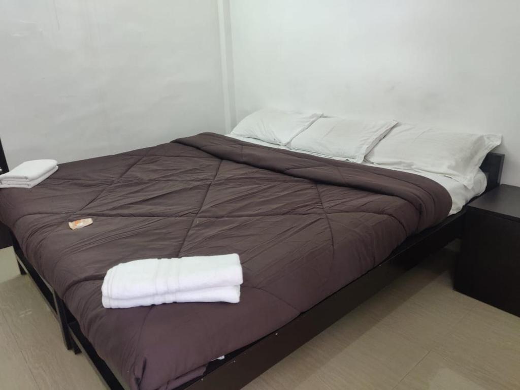 Postel nebo postele na pokoji v ubytování M3 Homes