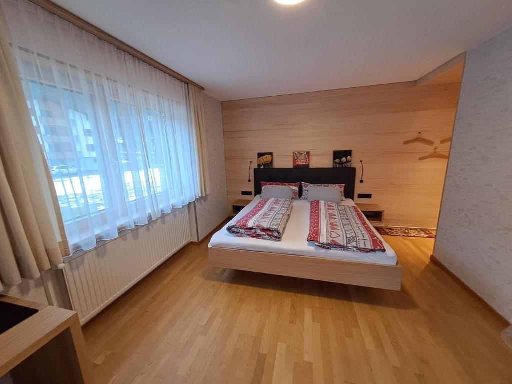 Postel nebo postele na pokoji v ubytování Gästehaus Manuela Puchmayr