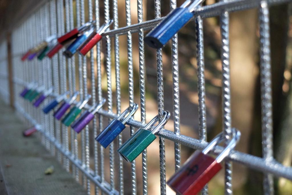 a bunch of colored toothbrushes hanging on a fence at Erlachmühle in Mondsee