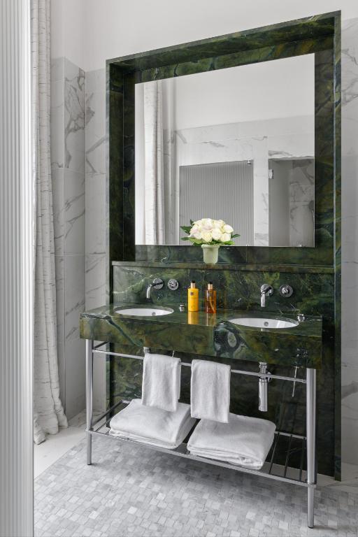 Baðherbergi á Hôtel Métropole Genève