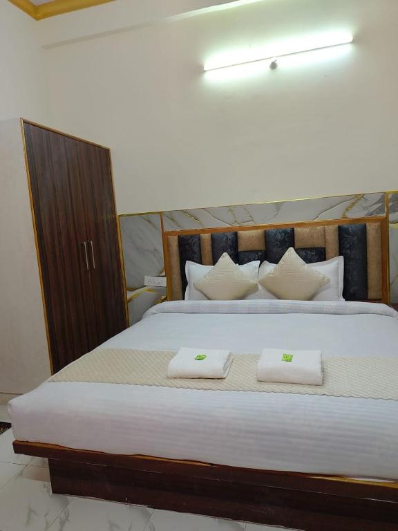 Postel nebo postele na pokoji v ubytování Hotel Ashoka B&B