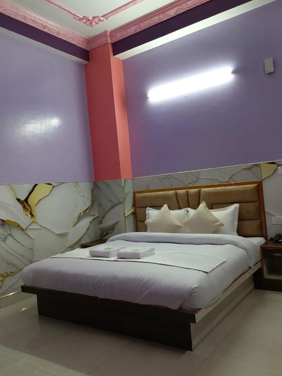 Postel nebo postele na pokoji v ubytování Hotel Ashoka B&B