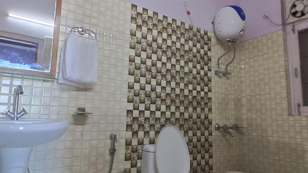 Koupelna v ubytování Hotel Ashoka B&B