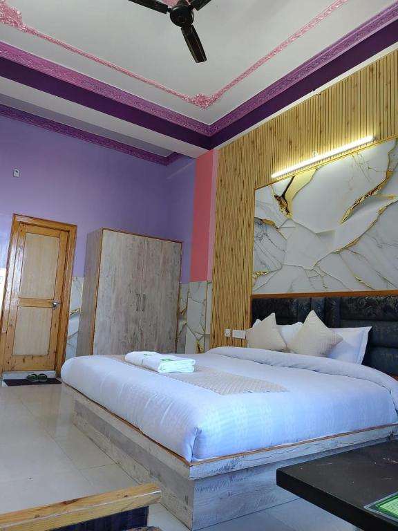 Postel nebo postele na pokoji v ubytování Hotel Ashoka B&B
