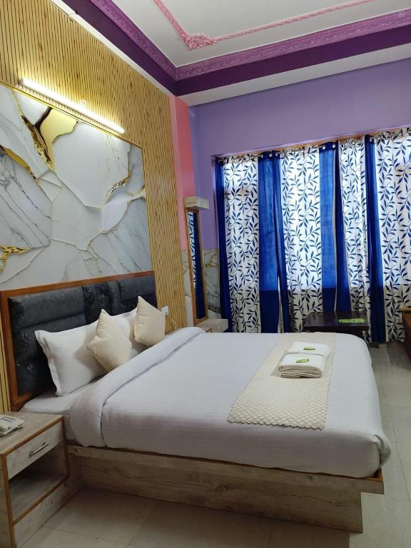 Postel nebo postele na pokoji v ubytování Hotel Ashoka B&B