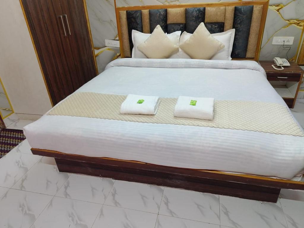 Postel nebo postele na pokoji v ubytování Hotel Ashoka B&B