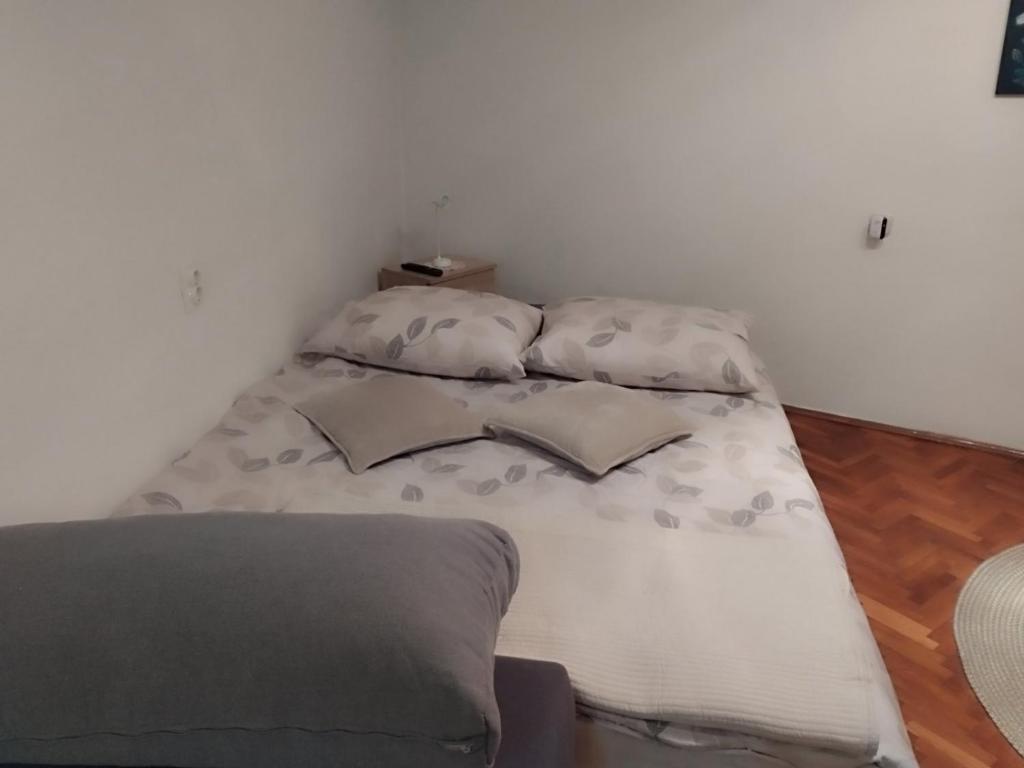 Postel nebo postele na pokoji v ubytování Studio apartman Lilijana