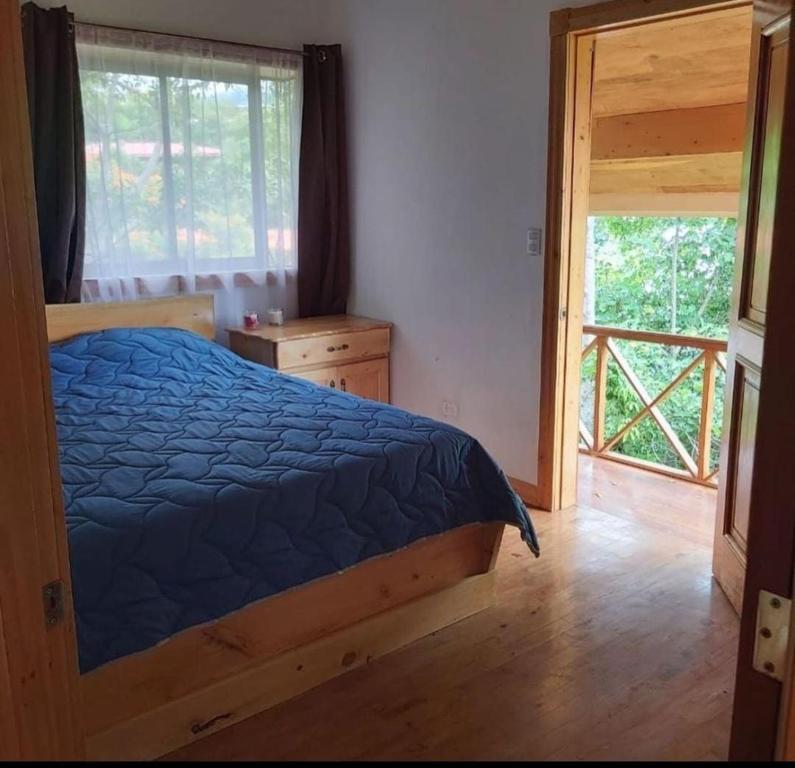 Postel nebo postele na pokoji v ubytování Cabañas La Laguna