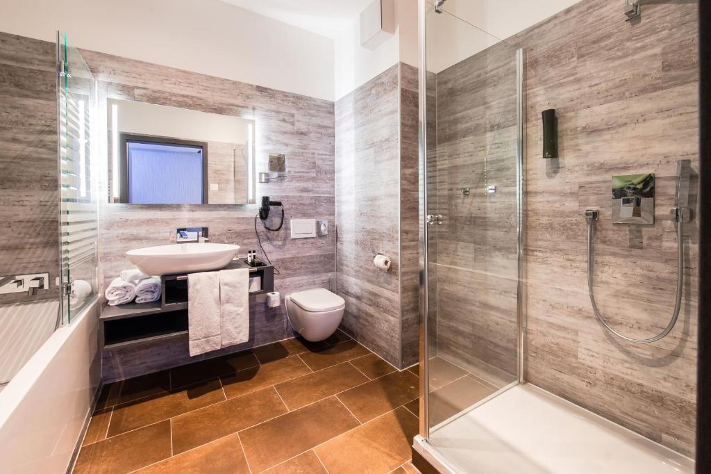 Koupelna v ubytování premium by GS Hotel