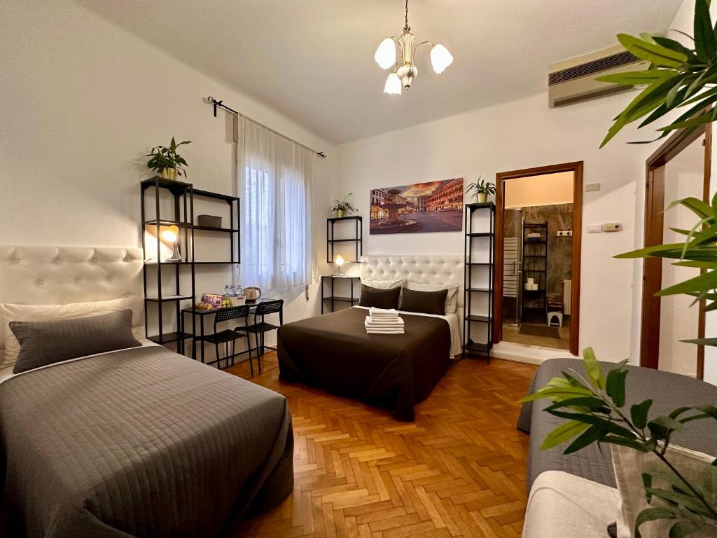 Postel nebo postele na pokoji v ubytování B&B CasaMia