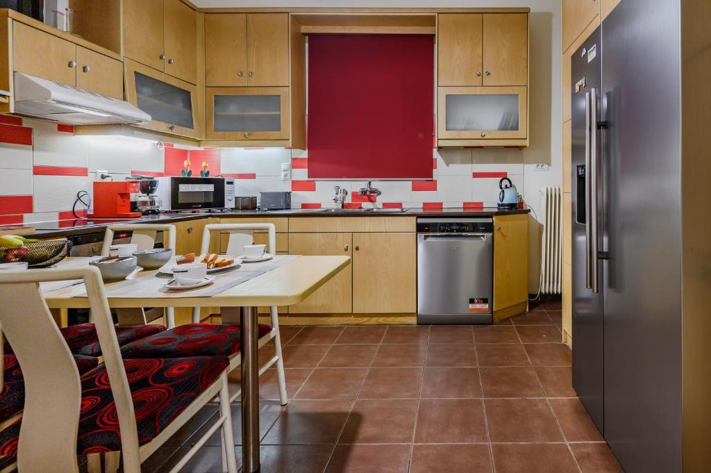 Kuchyň nebo kuchyňský kout v ubytování Seafalios Villa
