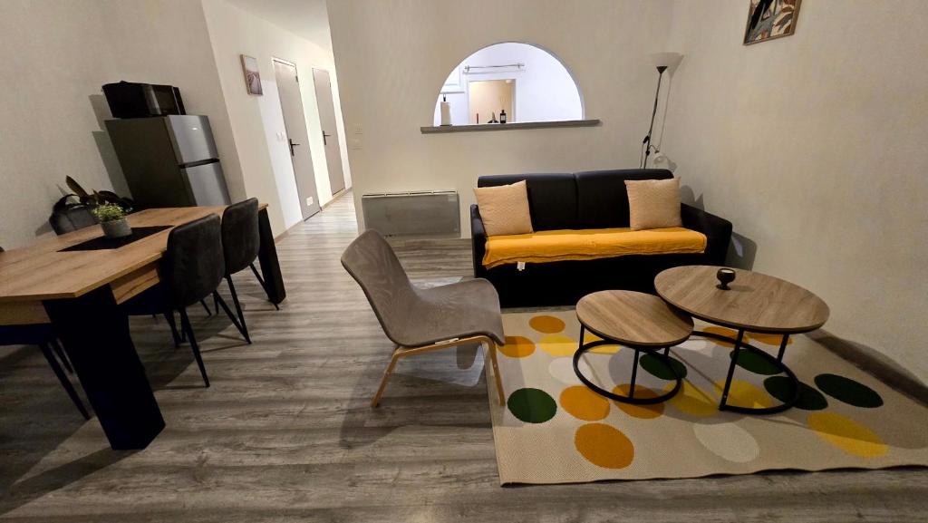 Posezení v ubytování Appartement 2 chambres, cuisine équipée