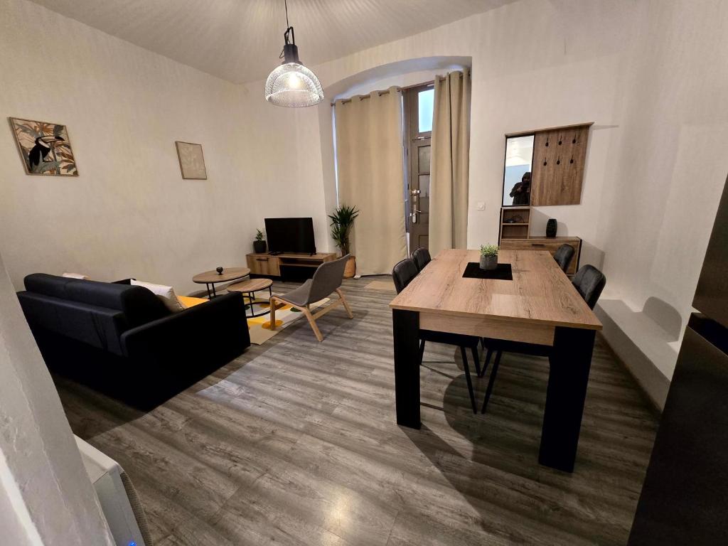 Posezení v ubytování Appartement 2 chambres, cuisine équipée