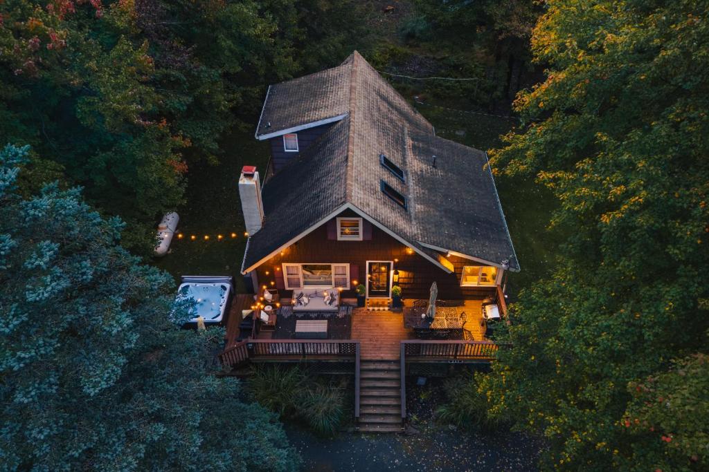 an overhead view of a house with a gambrel roof at Family Pocono Gem by the lake with private sauna, hot tub, and huge game room in Arrowhead Lake