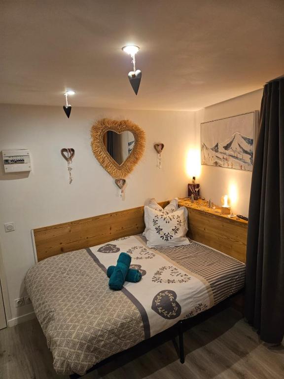 Ένα ή περισσότερα κρεβάτια σε δωμάτιο στο Petit STUDIO STAR CHAMONIX HYPER CENTRE