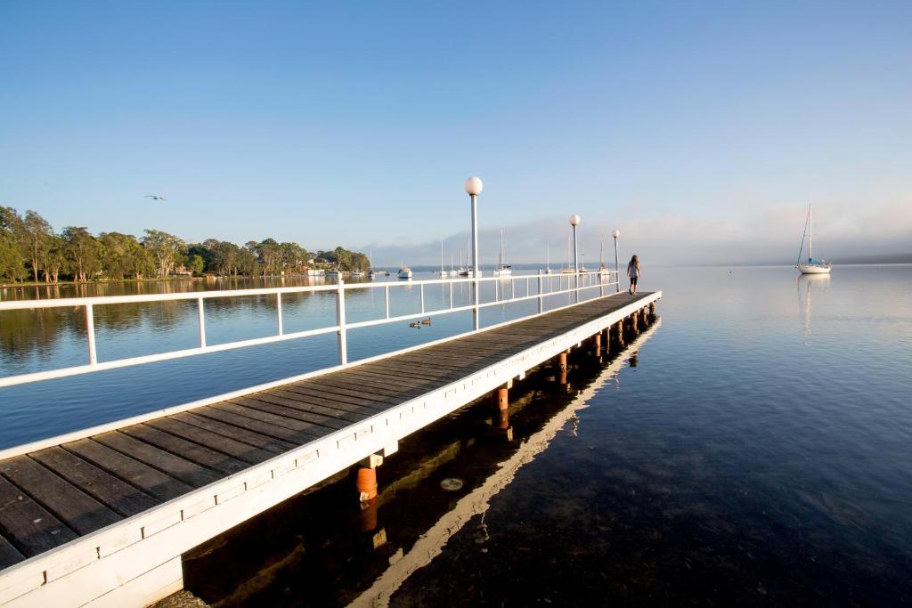 a pier with a large body of water at Ingenia Holidays Lake Macquarie in Mannering Park