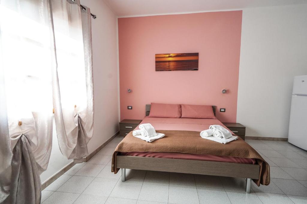 Posteľ alebo postele v izbe v ubytovaní Silvia Casa Vacanze