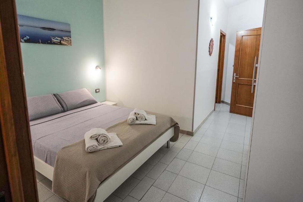 Posteľ alebo postele v izbe v ubytovaní Silvia Casa Vacanze