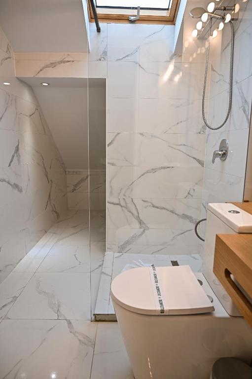 Koupelna v ubytování Camere de Inchiriat IGLOO