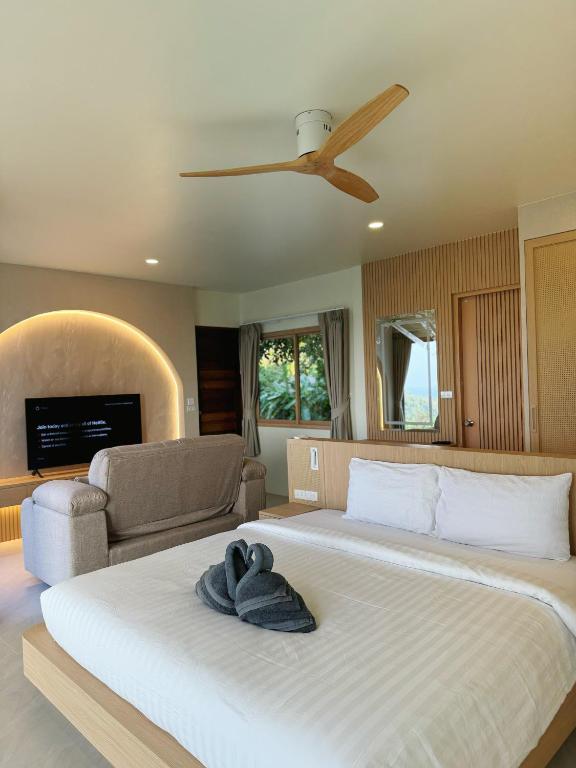 Ein Bett oder Betten in einem Zimmer der Unterkunft High Life Villas