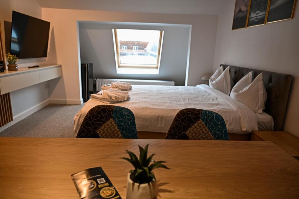 Postel nebo postele na pokoji v ubytování Camere de Inchiriat IGLOO