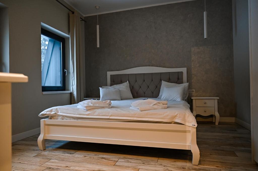Postel nebo postele na pokoji v ubytování Camere de Inchiriat IGLOO