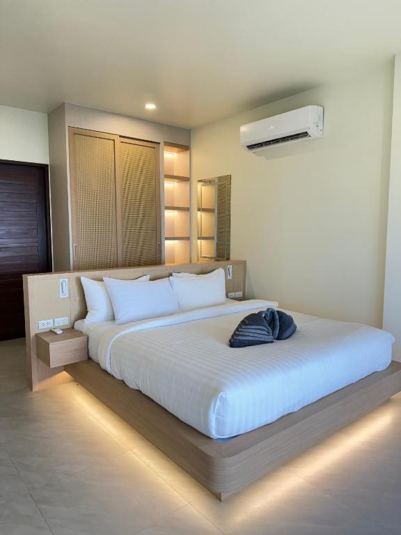 Ein Bett oder Betten in einem Zimmer der Unterkunft High Life Villas