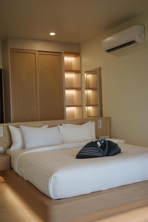 Ein Bett oder Betten in einem Zimmer der Unterkunft High Life Villas