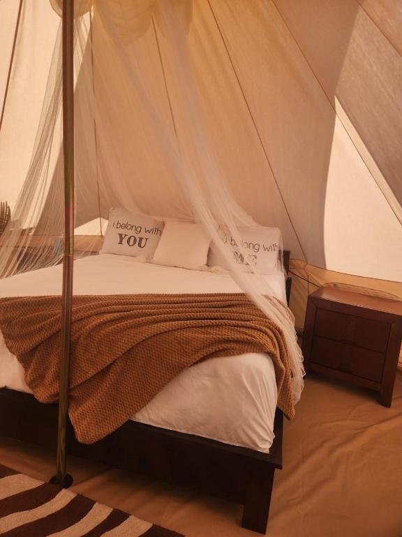 Postel nebo postele na pokoji v ubytování Bella Noni B&B