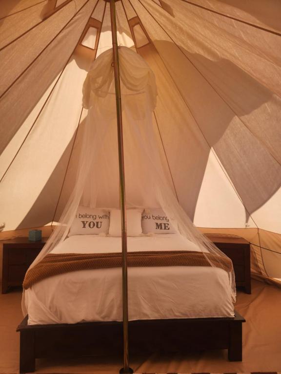 Postel nebo postele na pokoji v ubytování Bella Noni B&B