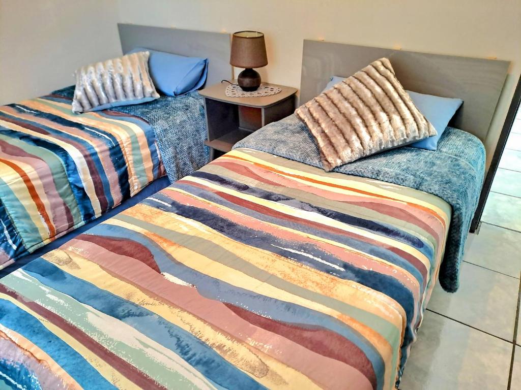Ένα ή περισσότερα κρεβάτια σε δωμάτιο στο Casa Mia