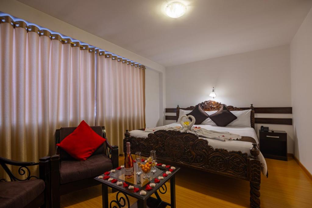 Postel nebo postele na pokoji v ubytování Hotel Kapac Inn-San Blas