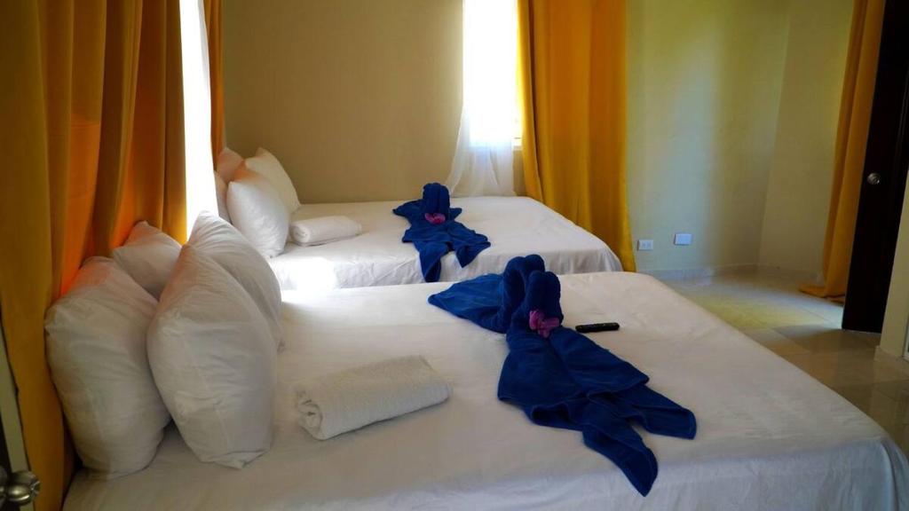 Letto o letti in una camera di Hotel Turístico Marian