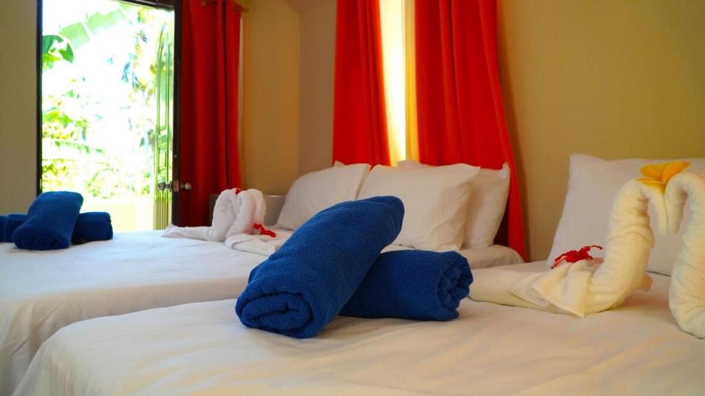 Letto o letti in una camera di Hotel Turístico Marian