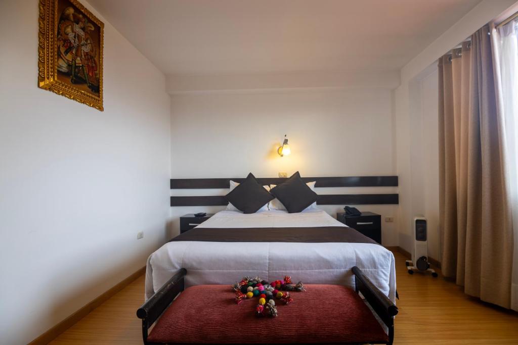 Postel nebo postele na pokoji v ubytování Hotel Kapac Inn-San Blas