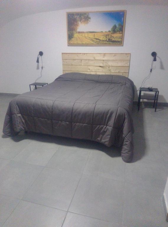 Łóżko lub łóżka w pokoju w obiekcie Pompei Civico 84