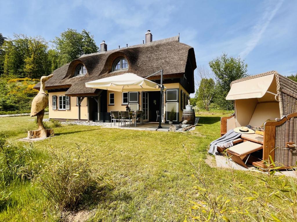 Κήπος έξω από το Ferienhaus Herrlich 01 Feriendorf Klein Stresow Rügen by ruyastay