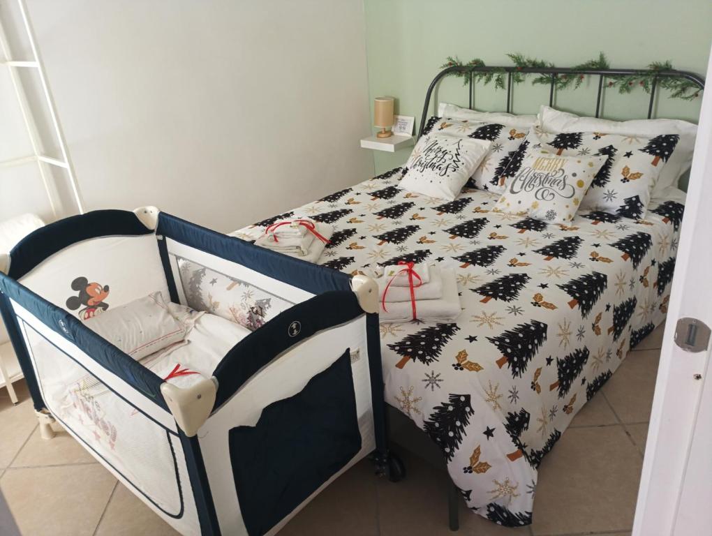 Postel nebo postele na pokoji v ubytování B&B La Casa di Beppe e Madia