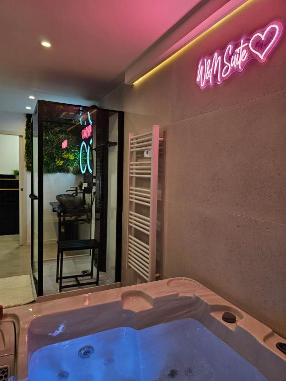 Postel nebo postele na pokoji v ubytování Appartement SPA - W&M Suite