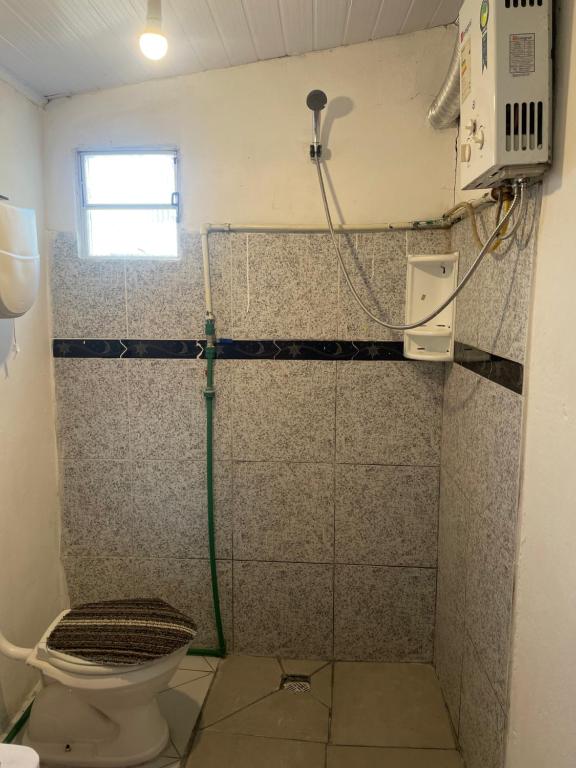 Koupelna v ubytování Alojamiento Lunas en Chuy con Baño Privado