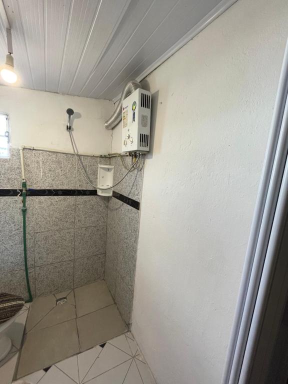 Koupelna v ubytování Alojamiento Lunas en Chuy con Baño Privado