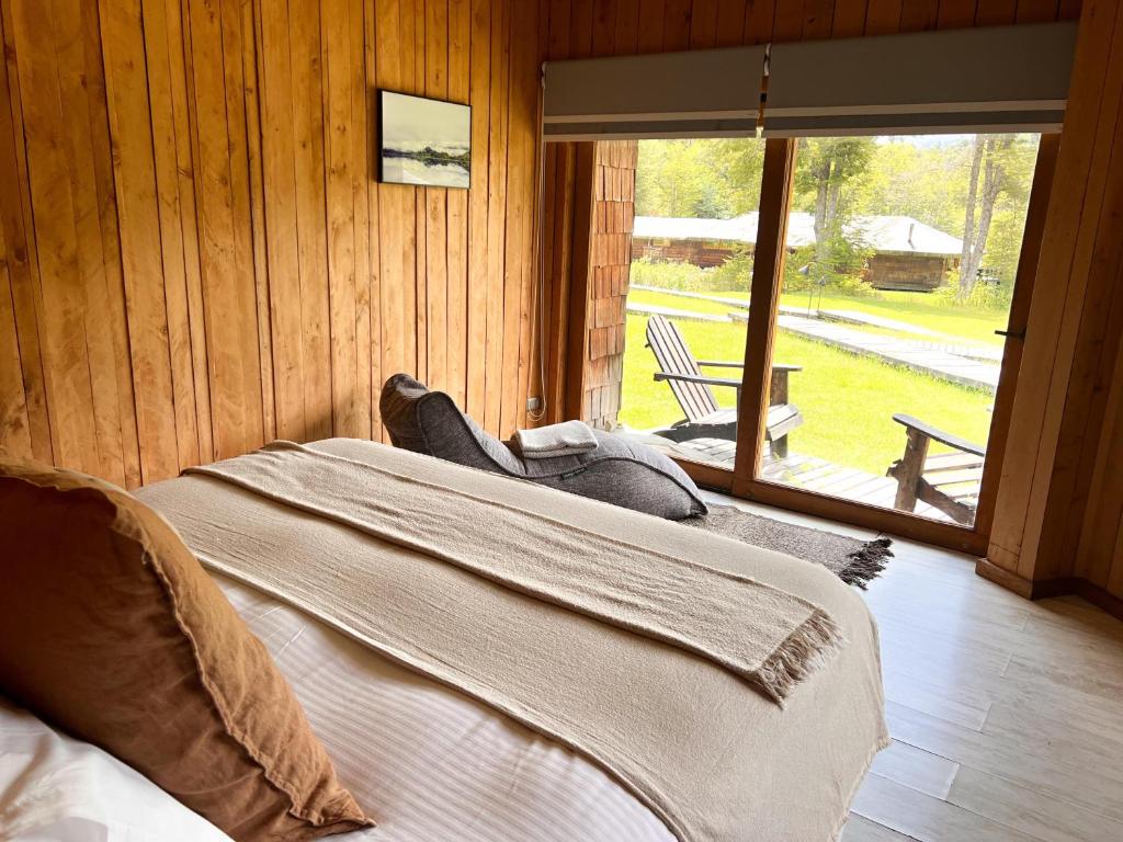 Postel nebo postele na pokoji v ubytování Peuma Lodge Patagonia