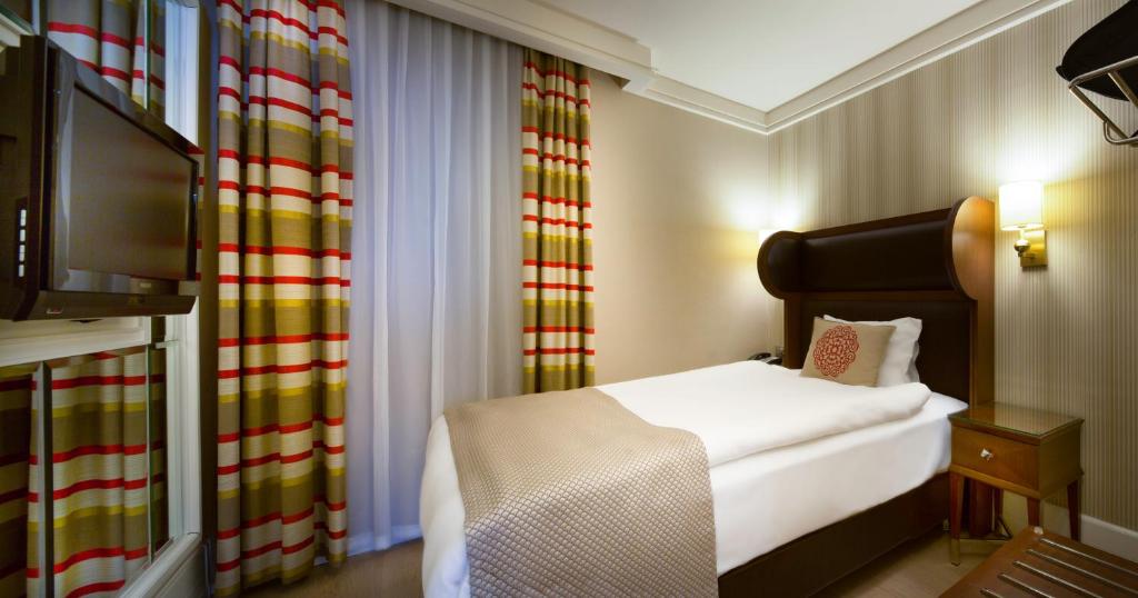 Postel nebo postele na pokoji v ubytování Titanic Comfort Sisli