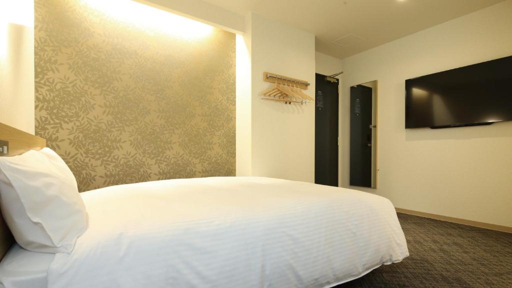 TV a/nebo společenská místnost v ubytování AB Hotel Sakaihigashi
